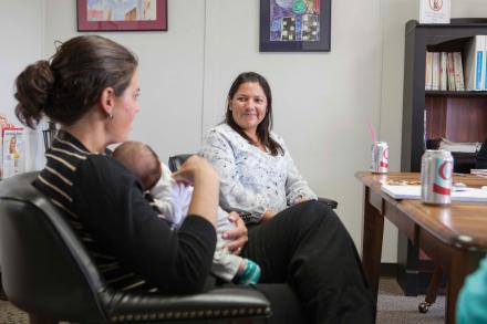 A mother and her newborn child visit a primary care provider. 