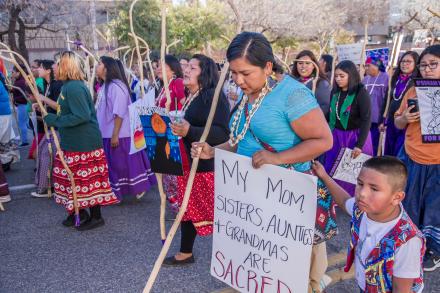 Native women walking during Women's March. Photo by Dulcey Lima on Unsplash.